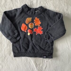 Whistle and flute leaves pullover